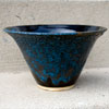 Photograph of a blue and black ceramic bowl